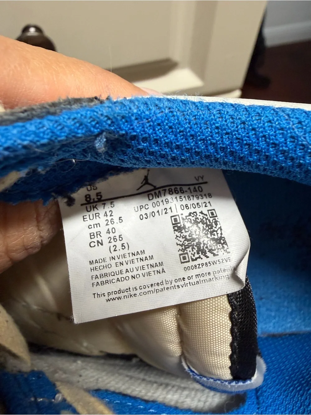 Jordan Low Retro Sneakers in White, Black, Blue & Cream